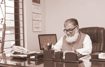 MR. MUJIB ULLAH KHAN in his office